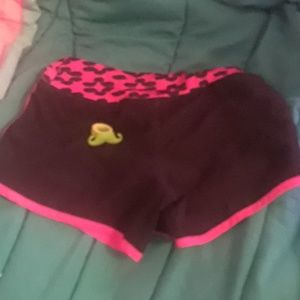 green mustache ring and a pair of swimming shorts